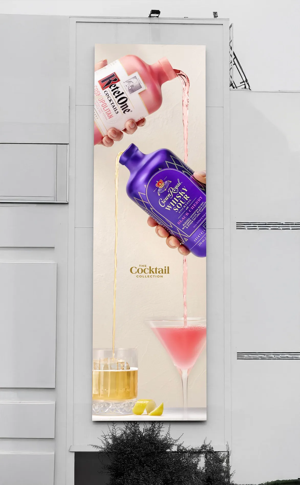 The Cocktail Collection poster on a building: Ketel One Cosmopolitan and Crown Royal Whisky Sour poured into their glasses