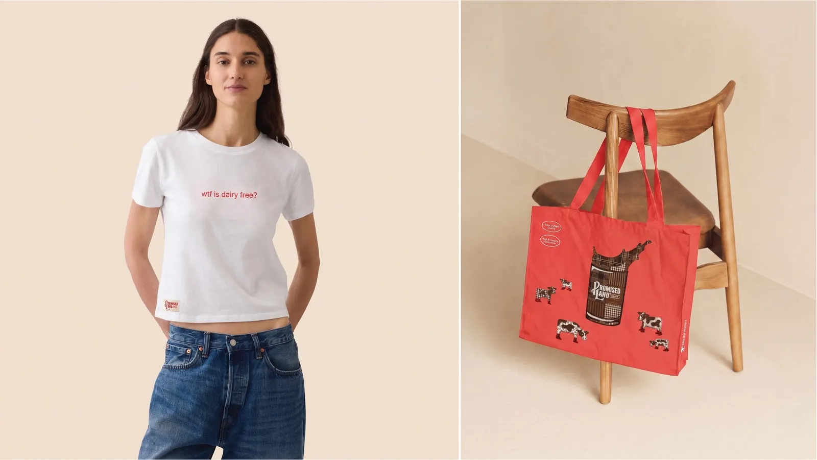 A woman in a white t-shirt reading “wtf is dairy free?” with a small Promised Land Dairy label at the hem, beside a red Promised Land Dairy tote bag hanging on a wooden chair
